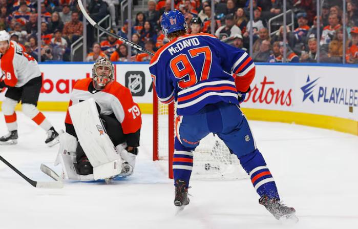 Carter Hart and Connor McDavid