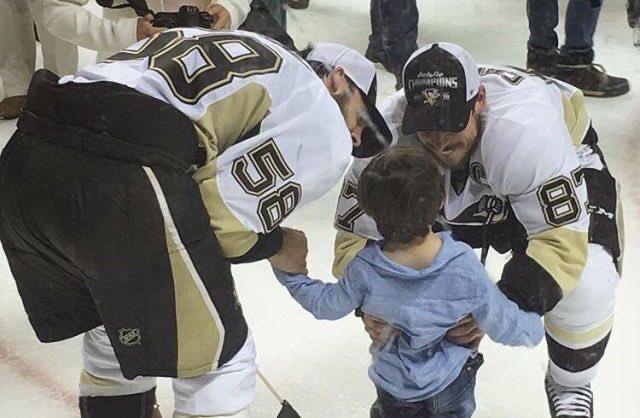 Kris Letang and Sidney Crosby. 