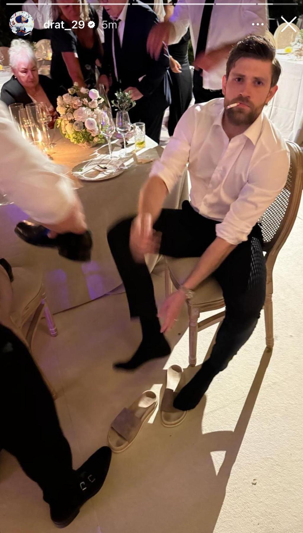 Leon Draisaitl smoking a cigarette. 