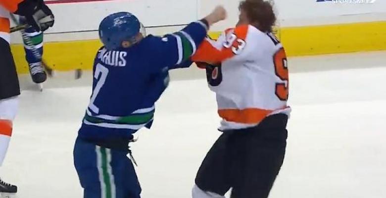 Fight: Voracek and Hamhuis throw down in a bloody brawl.