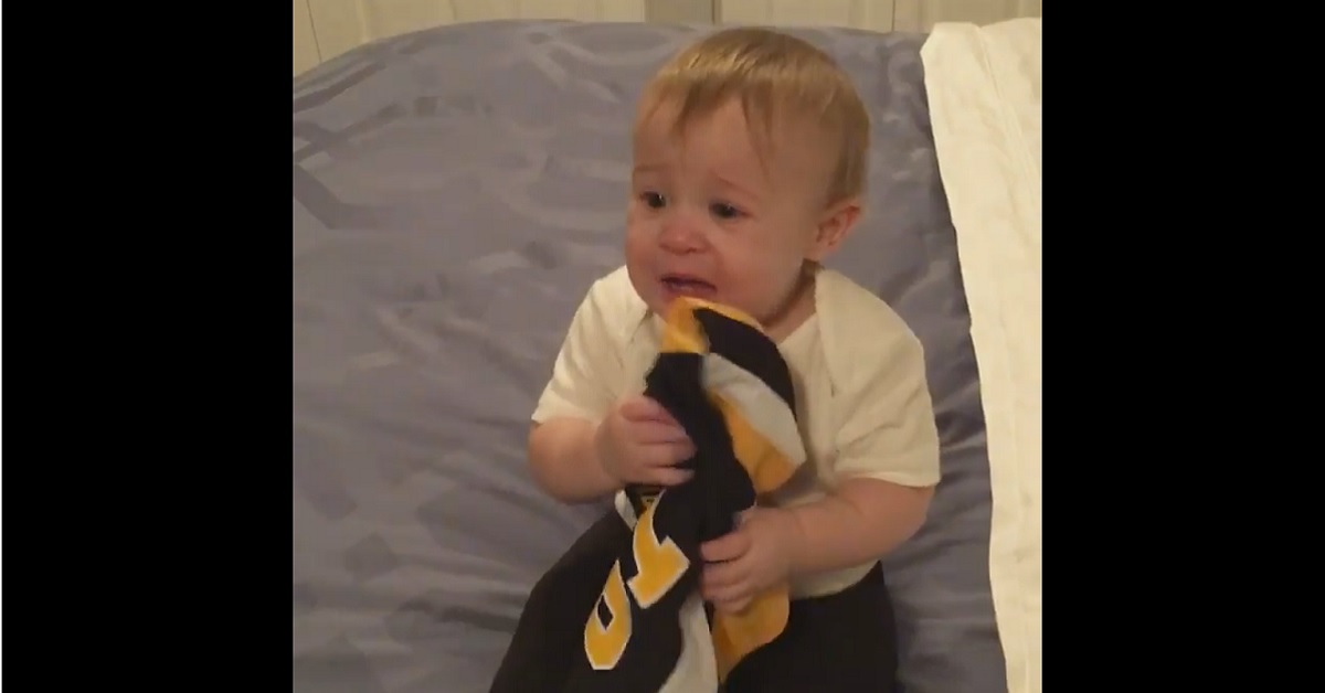 Little girl throws a tantrum when parents try to take away her favorite NHL jersey.