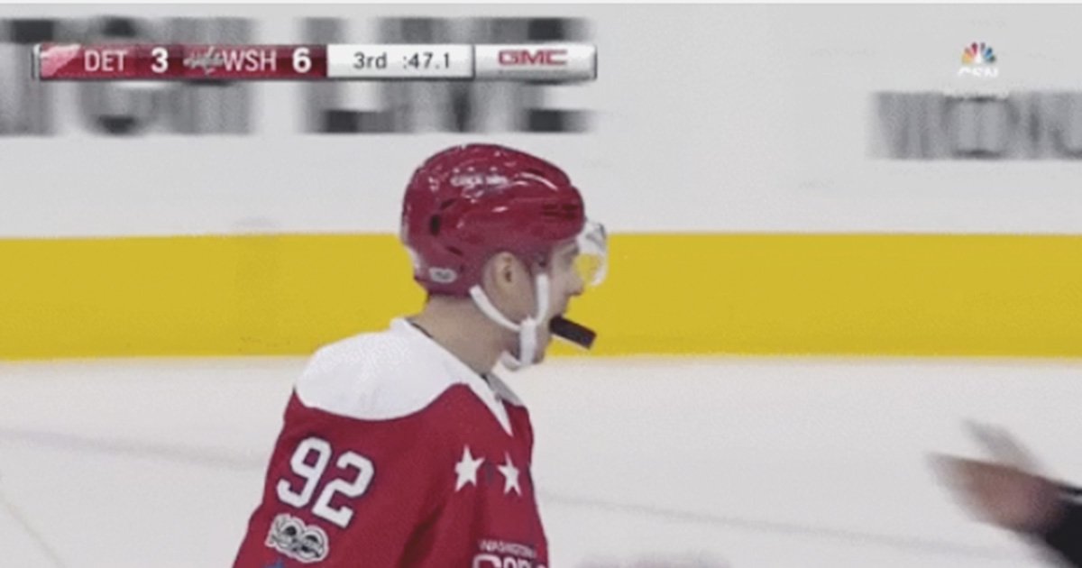Must see : Evgeny Kuznetsov giving the puck to the ref with his mouth.