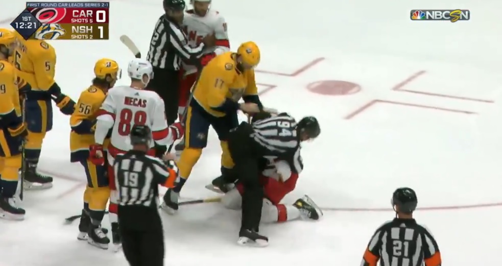 Ben Harpur shoves an official in Game 4.
