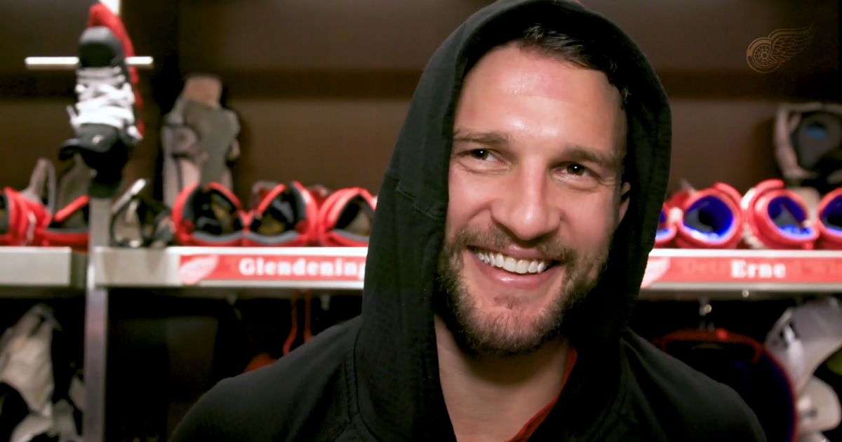 Luke Glendening trades a puck for girl scout cookies.