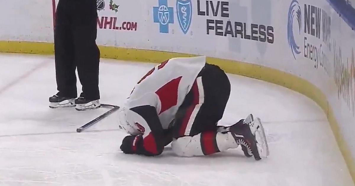 Breaking: Bobby Ryan gets crushed by a huge hit behind the net.