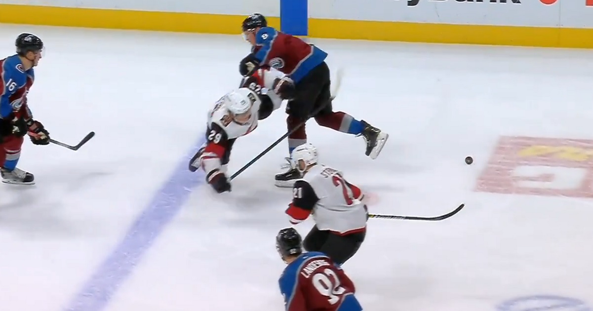 Cale Makar hunts down Barrett Hayton and delivers a clean open ice hit.