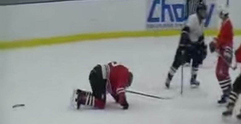 Video: Crazed player breaks his stick over his opponents head.