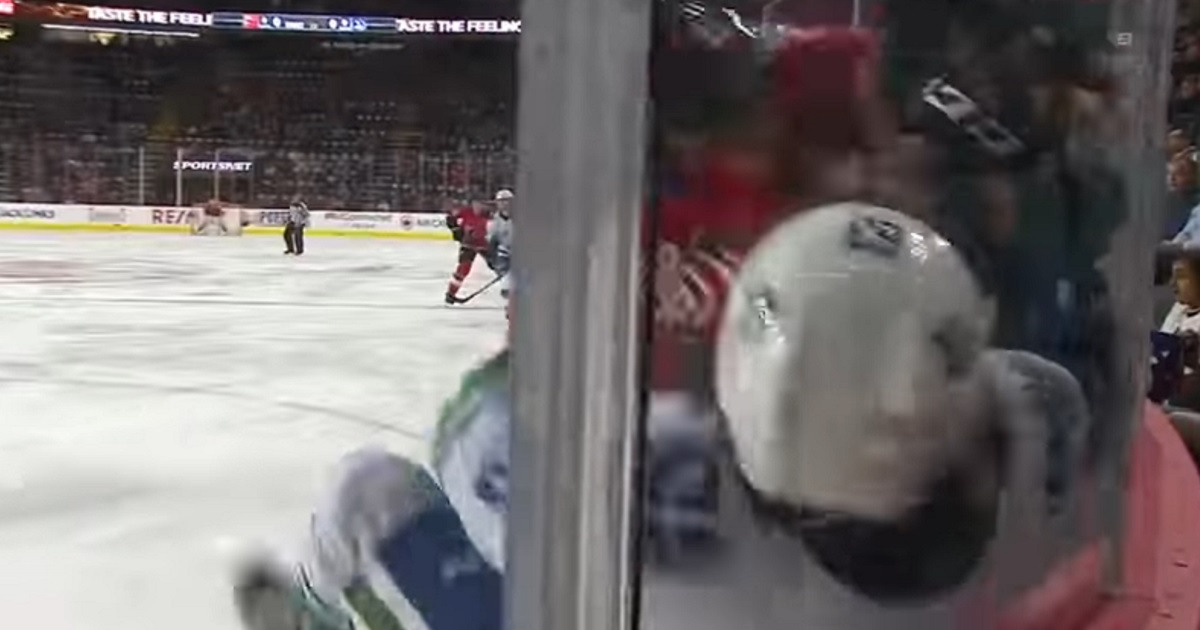Tanner Glass crushes his opponent against the boards, and scores while he's still down!