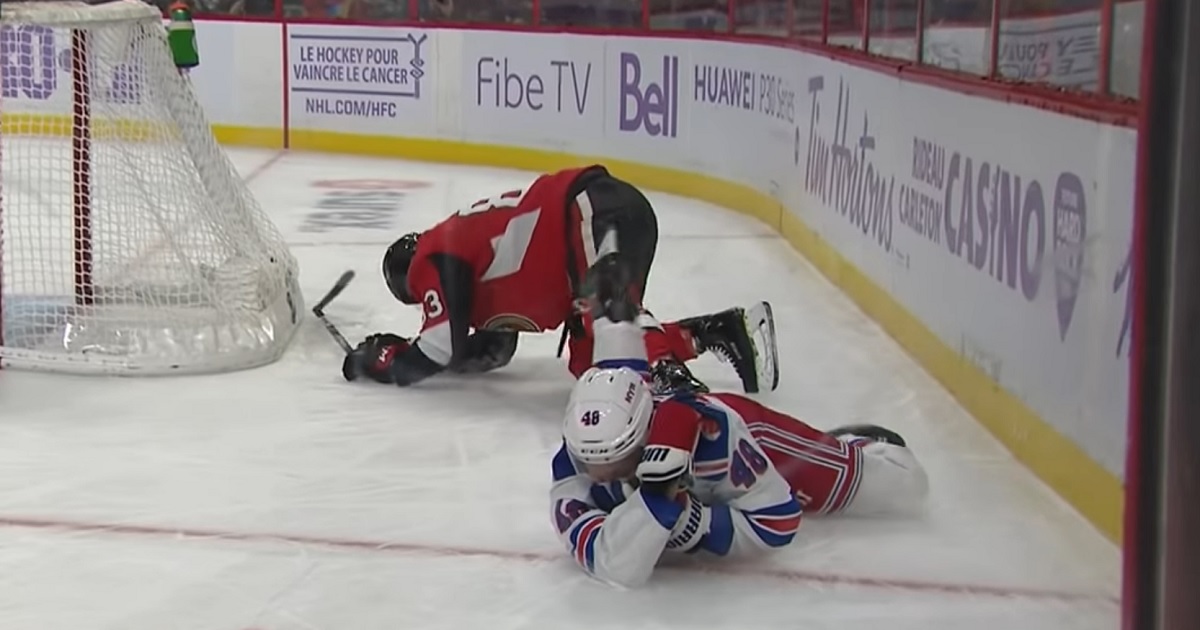 Brendan Lemieux loses his teeth after getting hit in the face by Christian Jaros.