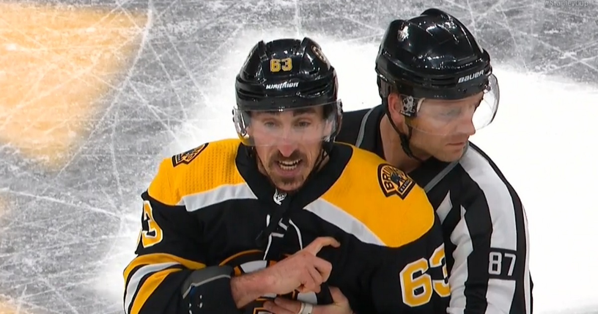 Brad Marchand mocks Hurricanes captain Justin Williams in Game 2.