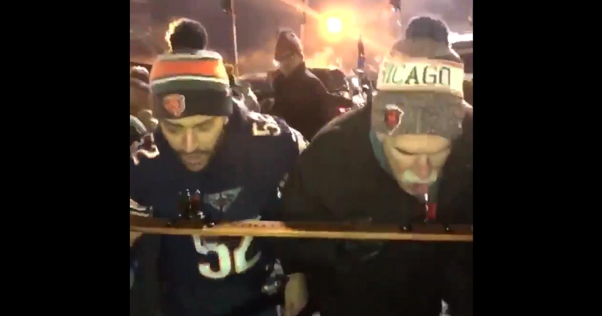 Joel Quenneville spotted knocking back shots outside the Bears game.