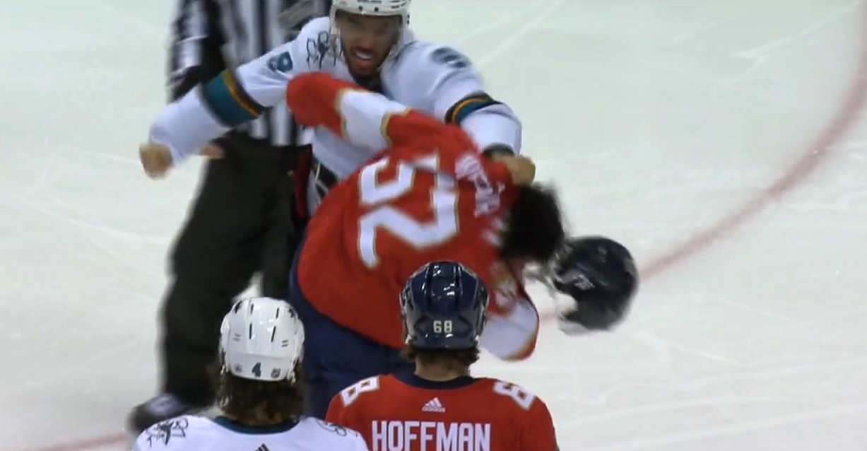 Evander Kane goes after MacKenzie Weegar after a big hit from Weegar.