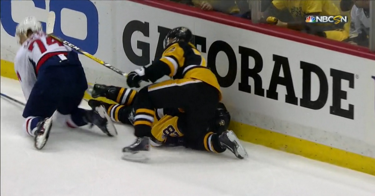 Breaking: Crosby goes head first into the boards after scary collision behind the net.