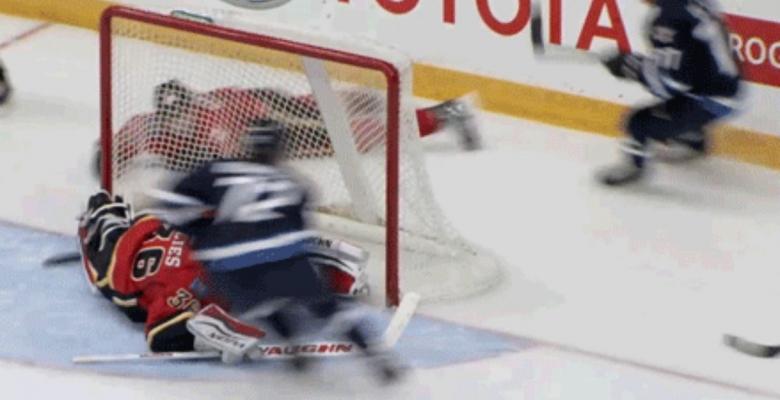 Flames prospect goalie makes unbelievable save in rookie tournament