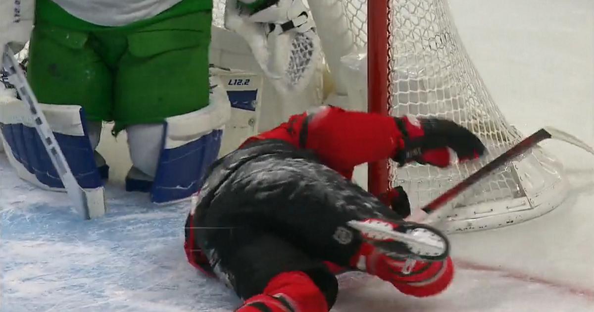 Mitch Marner sends Brady Tkachuk into the goalpost, nearly head first.
