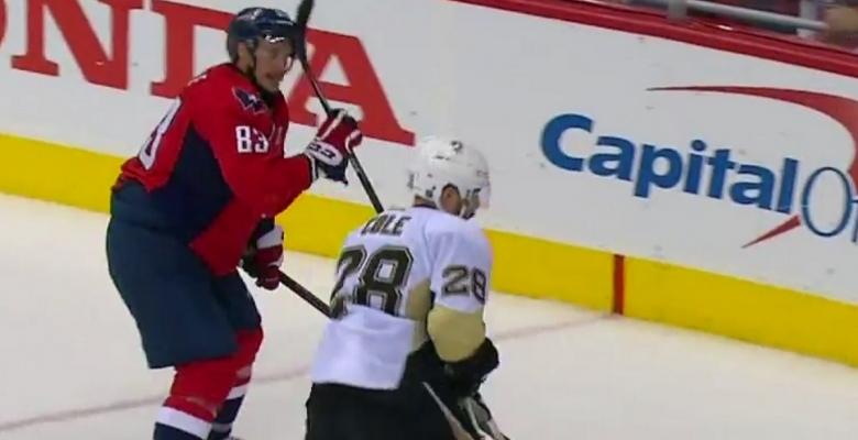 Beagle gets Letang's stick jammed in his helmet.
