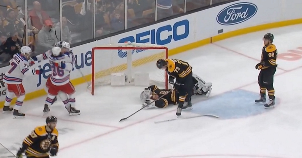 Tuukka Rask hurt after getting bulldozed into his own net.