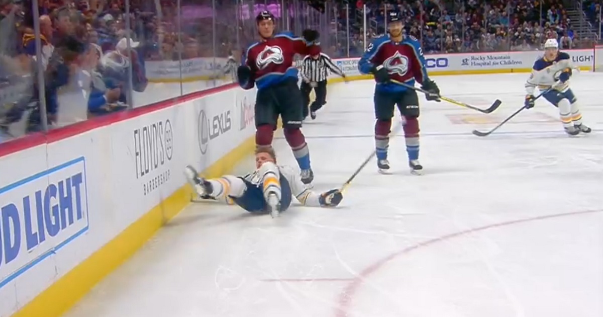 Zadorov levels Jack Eichel after the whistle has blown.