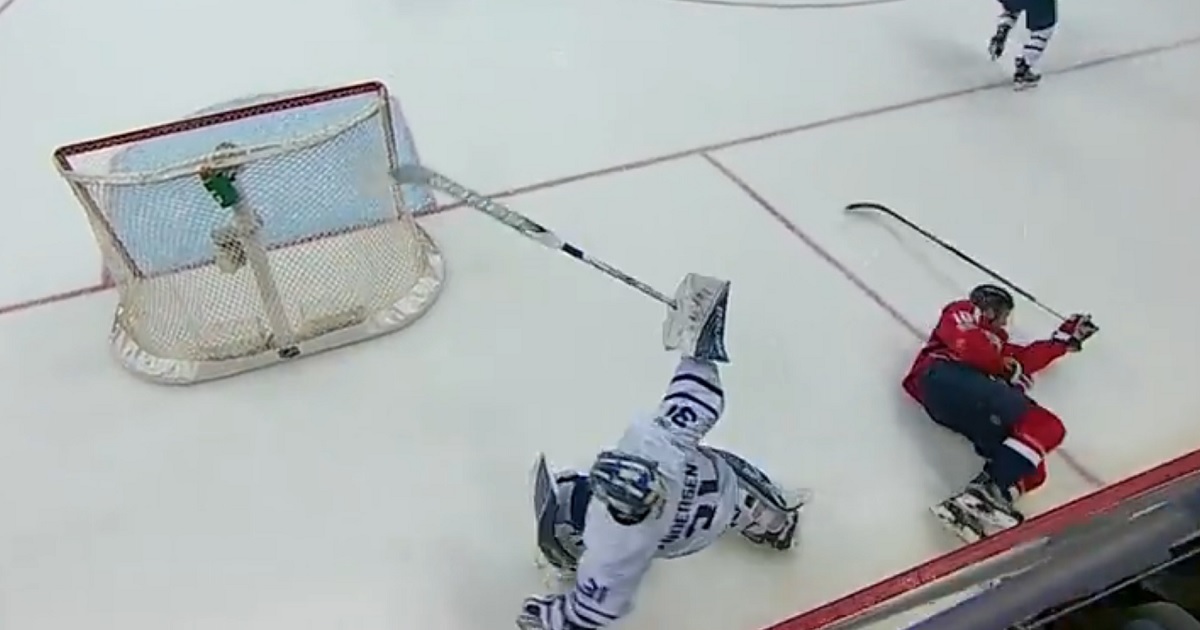 Leafs goalie Frederik Andersen delivers a big hit behind his net!