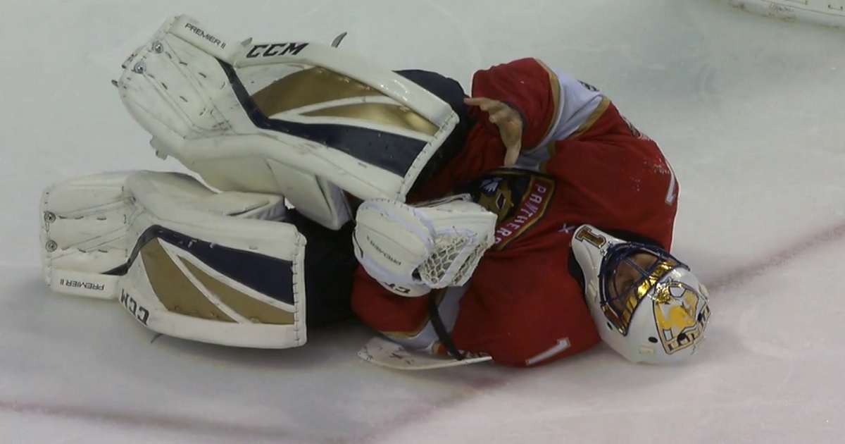 Breaking: Luongo goes down after getting hit in the crease.