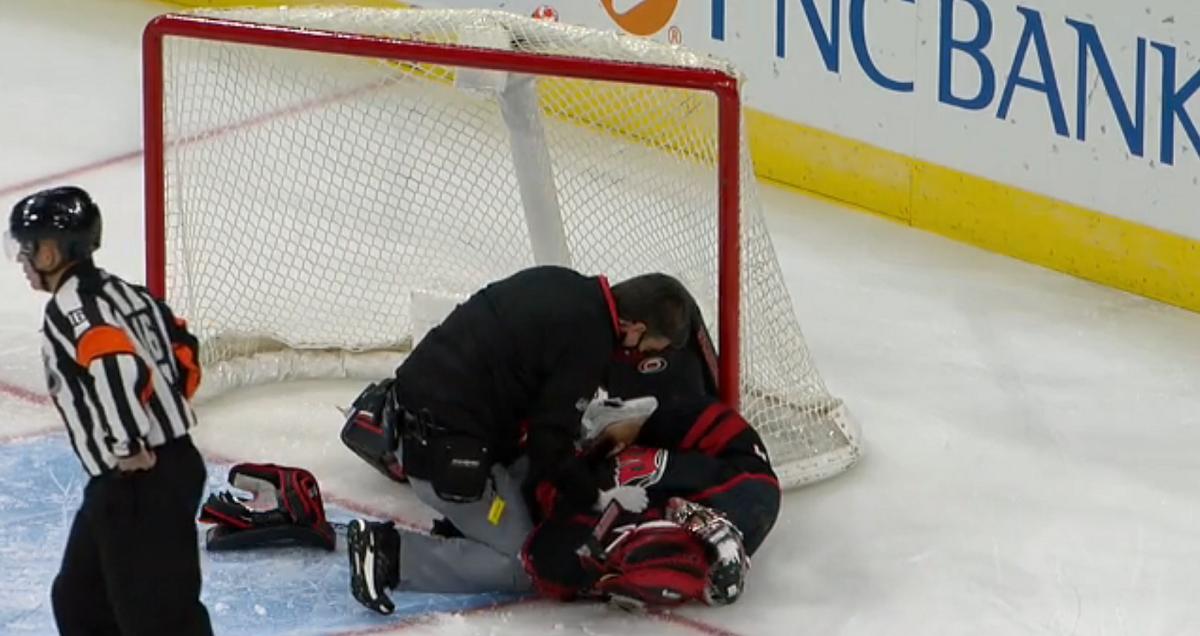Petr Mrazek leaves the game after being pancaked in his own net.