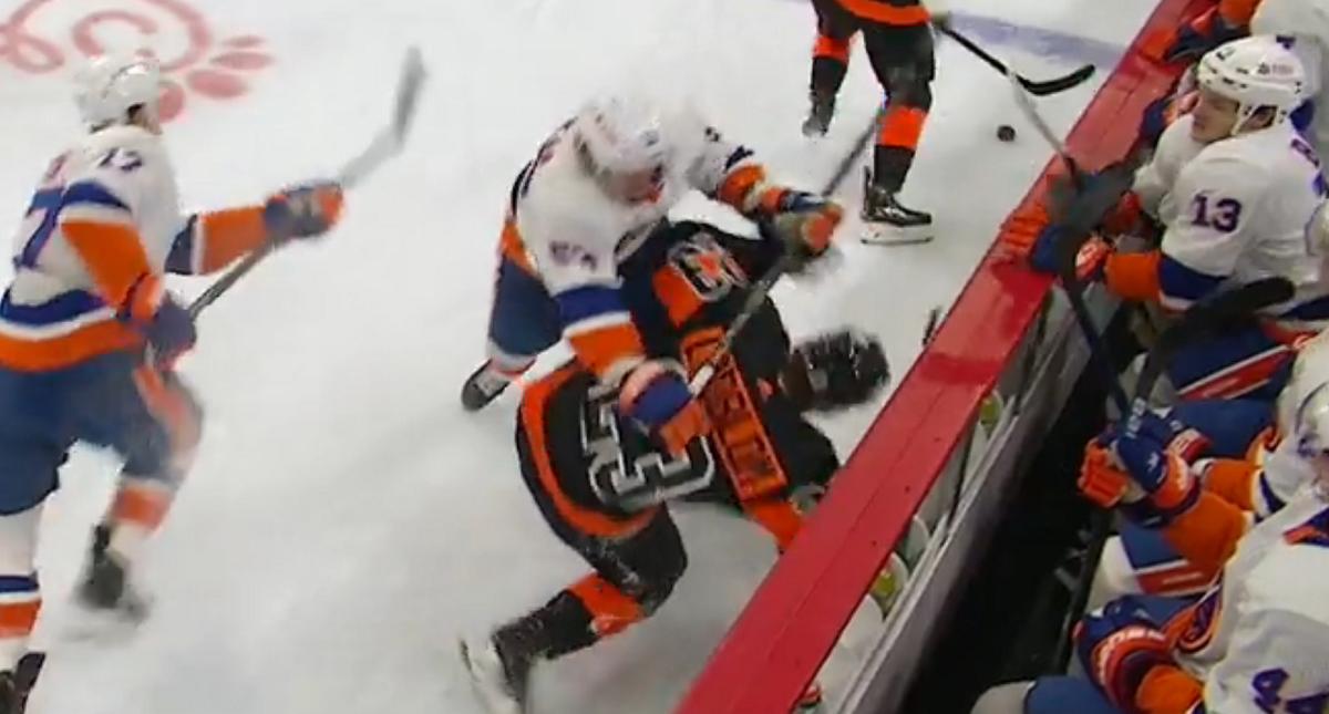 Casey Cizikas cross-checks Oskar Lindblom in the head.