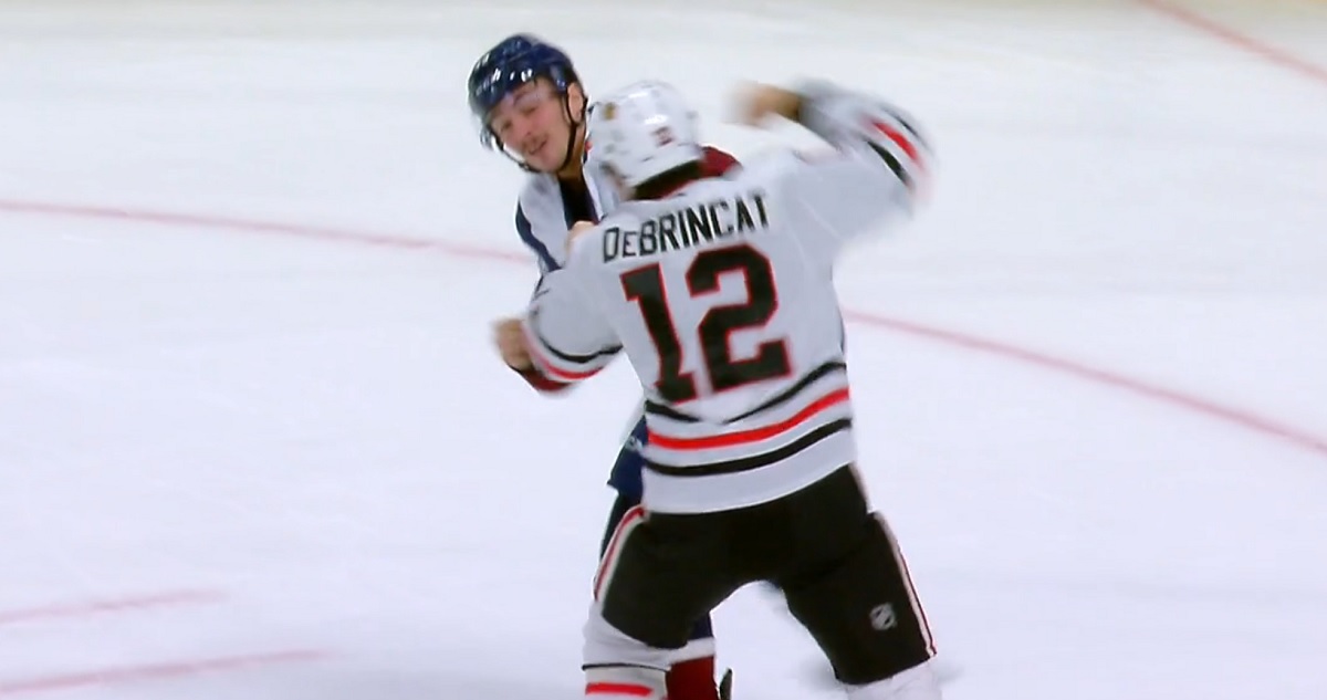Alex DeBrincat and Samuel Girard drop the gloves on Saturday night.