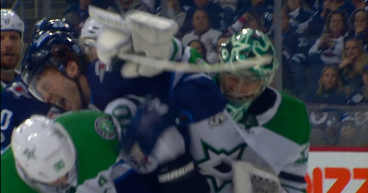 Ben Bishop punches Lemieux right in the face with his blocker. 