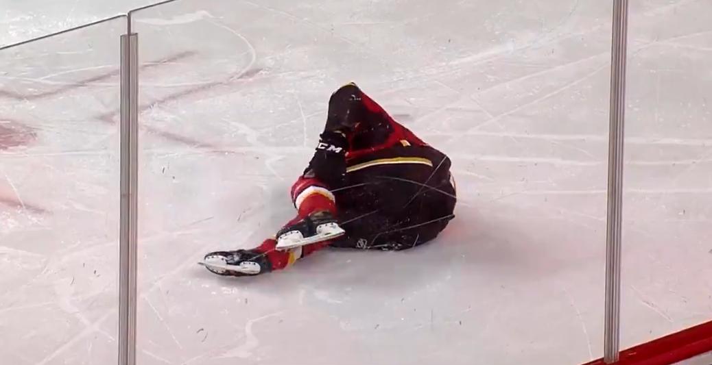 Pospisil in agony after taking one of the most awful looking hits of the year.