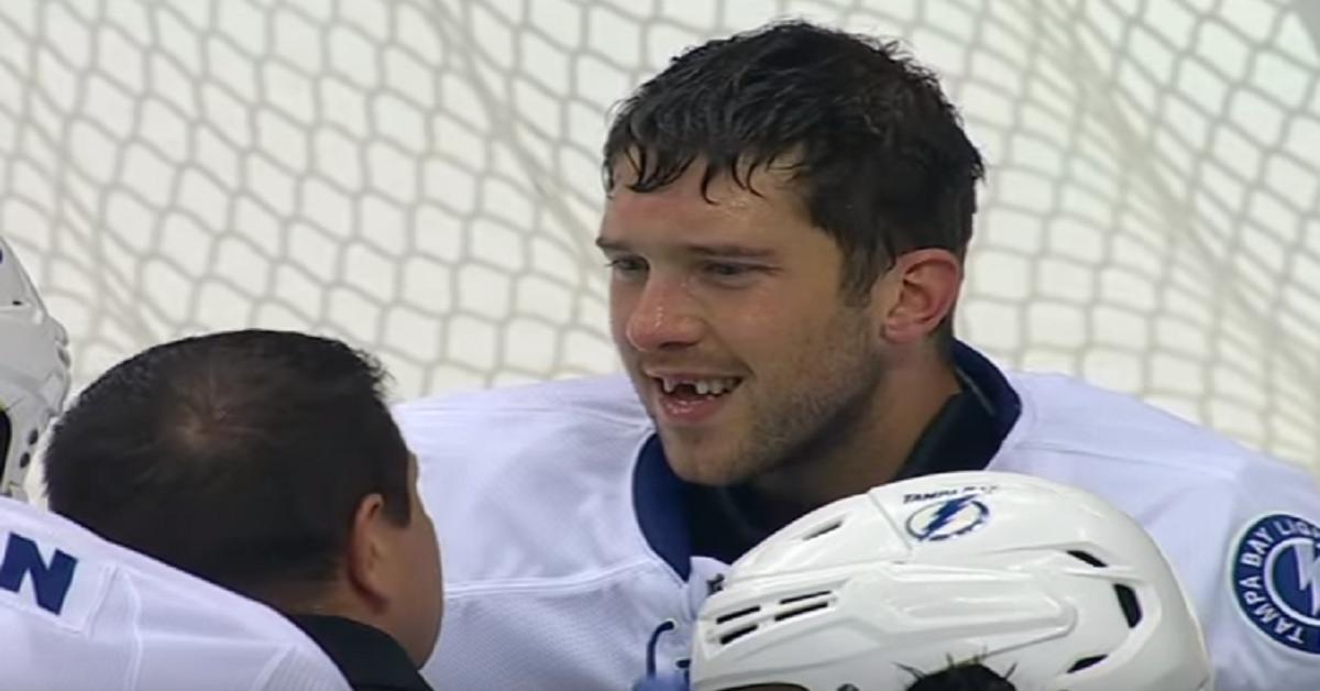 Goalie loses two front teeth after making save