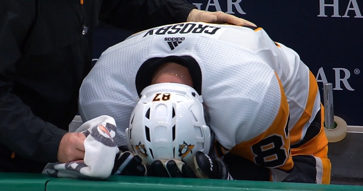 Crosby in agony after taking a slapshot from Kris Letang to the head!