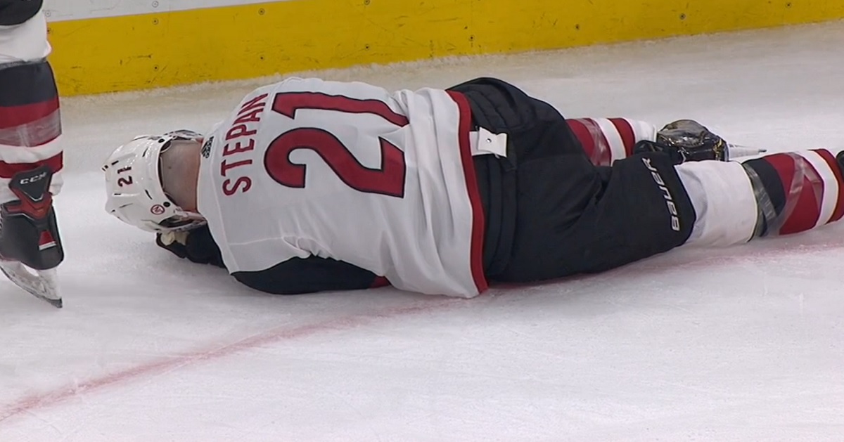 Jeremy Lauzon gets tossed after a bad hit on Derek Stepan.