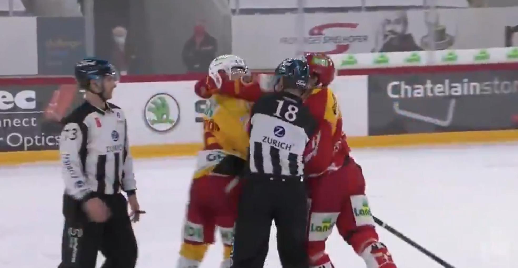 Damien Brunner sucker punches Erik Brannstrom.