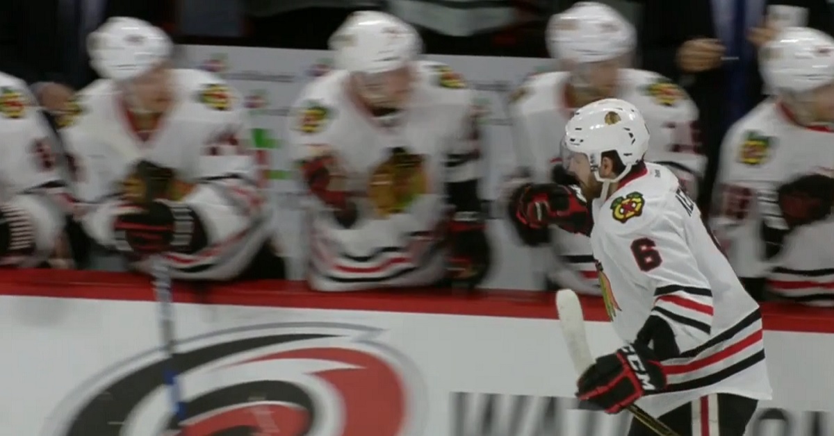 Toews sets up rookie defenseman for his first career goal.