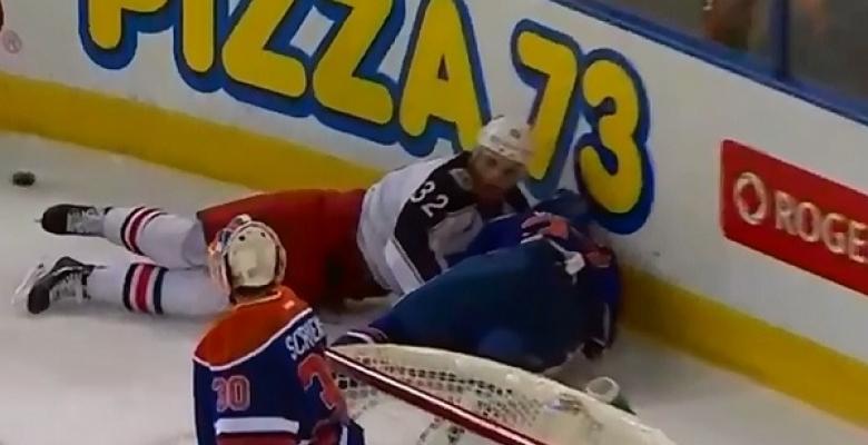 Gordon goes head and neck first into the boards after scary hit.