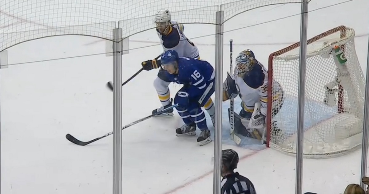 Marner gets doubled over by a low blow from the goalie!