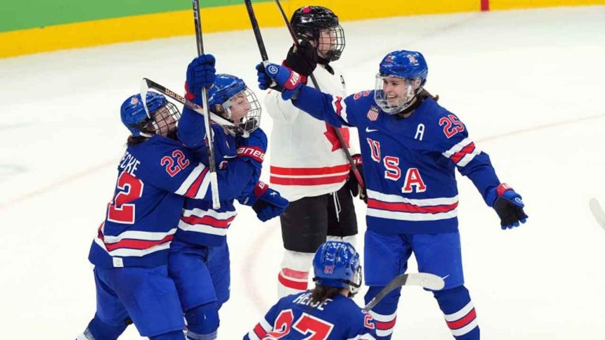 Women's hockey: USA beats Canada in OT. 